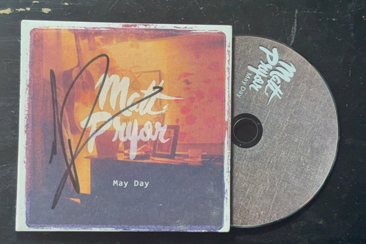 CD with cover featuring 'Matt Papa' and 'May Day' on a dark surface